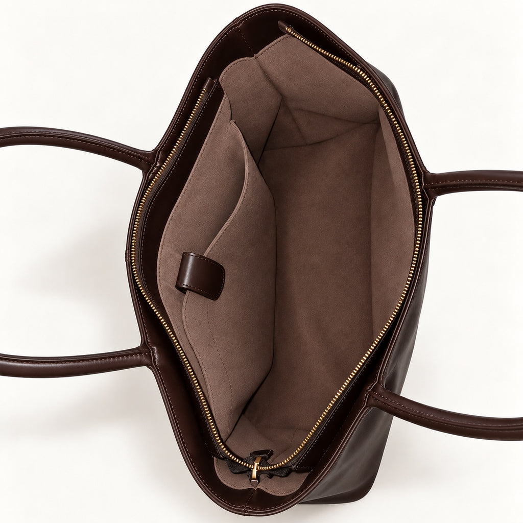 Sirius Society chocolate brown leather tote bag with long handles on a neutral background